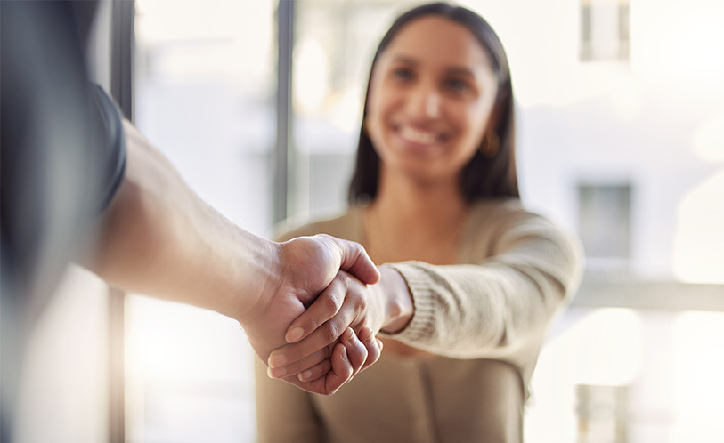 pharmacy2u partners image, woman shaking a mans hand